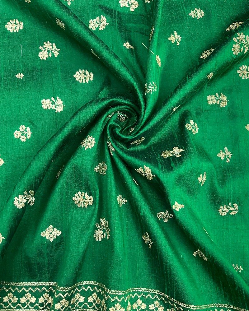 Vibrant emerald green raw silk fabric