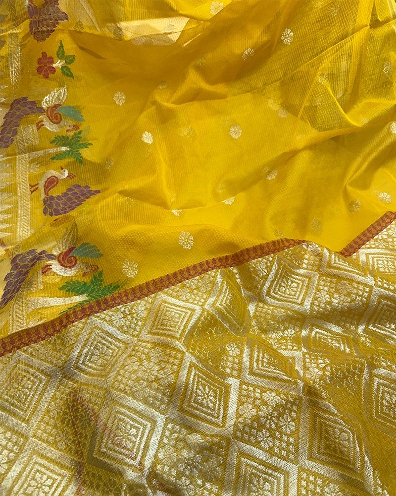 Bright yellow Zari Kota saree