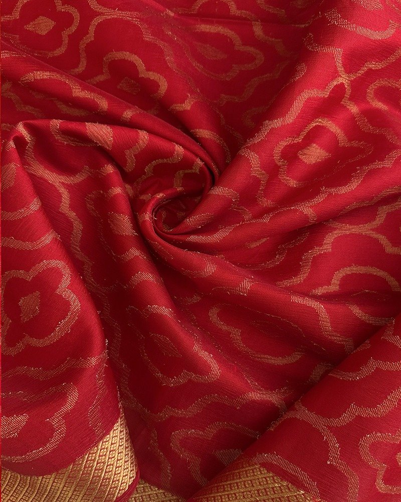 Red Tussar zari symmetrical pattern